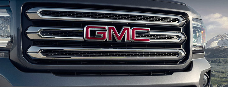 Image of the distinctive grill on the 2017 GMC Canyon small pickup truck, showing the GMC logo text.