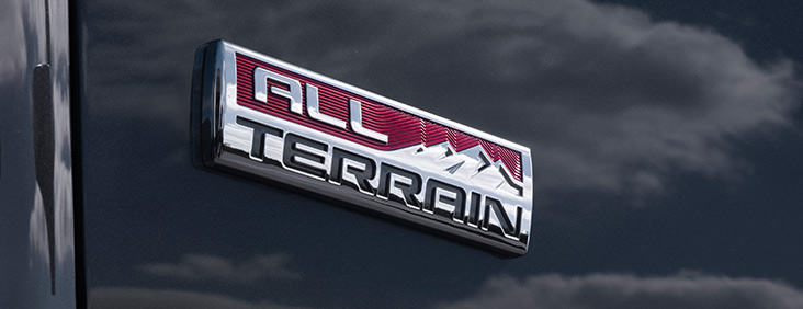 Image of the All Terrain logo featured on the special edition of the 2017 GMC Canyon small pickup truck.