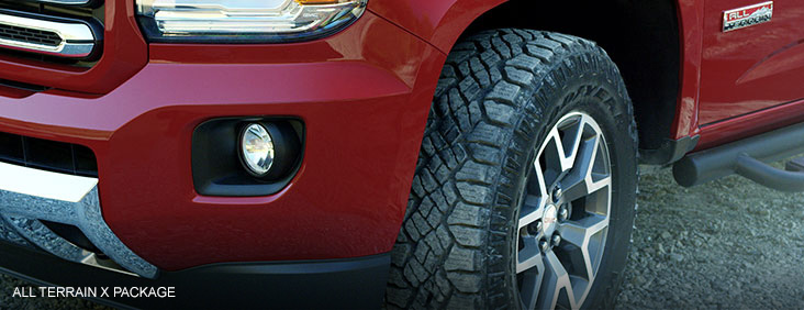 Image of the front left tire of the 2017 GMC Canyon All Terrain X pickup truck.