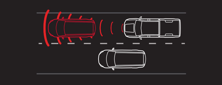 Diagram showing the operation of the Forward Collision Alert available for the 2017 GMC Canyon pickup truck.